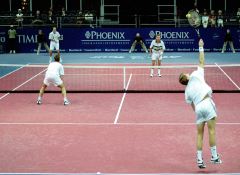 Rick Leach (returning serve at far left) and Ellis Ferreira (far right)