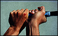Twohand Grip with dominant hand in full eastern backhand/western backhand, Left