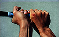 Twohand Grip with dominant hand in full eastern backhand/western backhand, Right