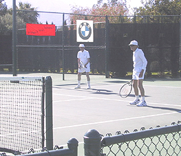 l. to r. Sharer, Johnson on
court against Francis Gay and Charles Hurme.